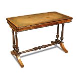 An amboyna wood and walnut writing table in the manner of Holland & Son - late 19th century, with