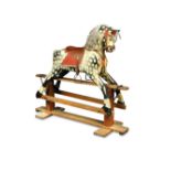 A large dapple grey child's rocking horse - early 20th century, on a traditional stand 120 x
