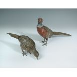 A brace of Austrian cold painted bronze pheasants, each numbered to underside of tail (2) 22 x