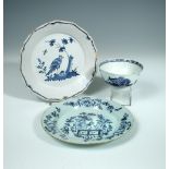 A Delft blue and white pancake plate, probably London, of shaped circular form, the centre decorated