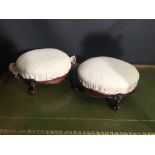 A pair of Victorian mahogany framed circular footstools, upholstered in a linen, on florette and