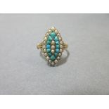 A 19th century turquoise and seed pearl ring of navette form, the central line of three seed