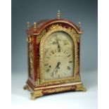 Thomas Hunter, London, an 18th century red lacquer and gilt chinoiserie bracket clock, the arched