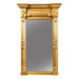 A gilt framed pier glass - 19th century, with gesso moulded frieze and column moulded frame 120 x