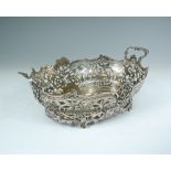 A Dutch silver two handled oval basket, date letter for 1935, the sides pierced and cast with