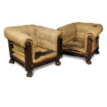 A pair of late Regency mahogany upholstered library chairs, the square back frames carved on all