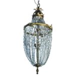 A gilt framed basket chandelier with lustre drops - early 20th century, with acanthus leaf moulded