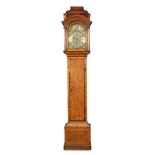 An imposing walnut seaweed marquetry longcase clock, Delander and adapted, the caddy top hood with