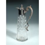 A silver mounted claret jug, by Sterling Silverware Ltd, Sheffield 1976, with plain collar and