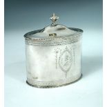 A George III silver tea caddy, by John Denzilow, London 1786, oval with bright cut design within