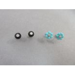 A pair of diamond and onyx earstuds and a pair of diamond and turquoise earstuds, the first pair