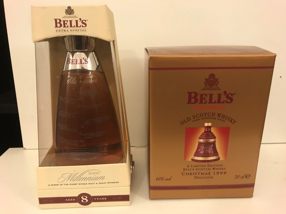 Bells whisky commemorative Wade decanters, sealed. Millennium 2000, boxed; Christmas 1999 limited