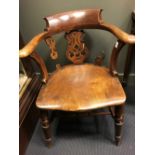 A 19th century century ash & elm 'smoker's bow' armchair, faults. 79cm h