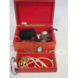 A red leather jewel box and a quantity of jewellery to include a 15ct old cut diamond cluster bar