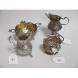 A continental silver gilt sugar basket with embossed floral decoration, sponsor's mark of Robert