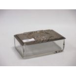 A Continental cut glass and white metal mounted table box, embossed with horses and clover leaf to