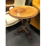 A late Victorian walnut tripod table and another similar (2)