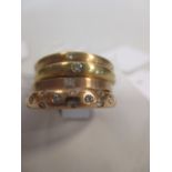 Four 18ct diamond rings: a rose gold half hoop diamond ring, London 2004, size L; a single stone