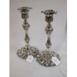 A pair of 19th century EPNS candlesticks, marked CM & Co, 25cm high