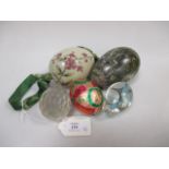 A late 19th century Russian glass egg painted with flowers, two other glass eggs, a paper egg box