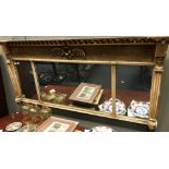 A Regency gilt framed overmantel mirror with Egyptian revivial column sides, 68cm h x 143cm