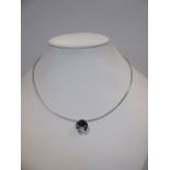 A single stone diamond platinum necklet, the round brilliant diamond, estimated approx. 0.50cts, set