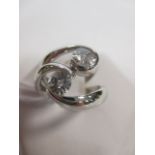 Two fancy cut diamond and platinum rings, the first a round fancy cut diamond, estimated approx. 0.