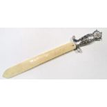 A Victorian ivory bladed page turner with silver mount, maker ?B (indistinct), London 1885, modelled