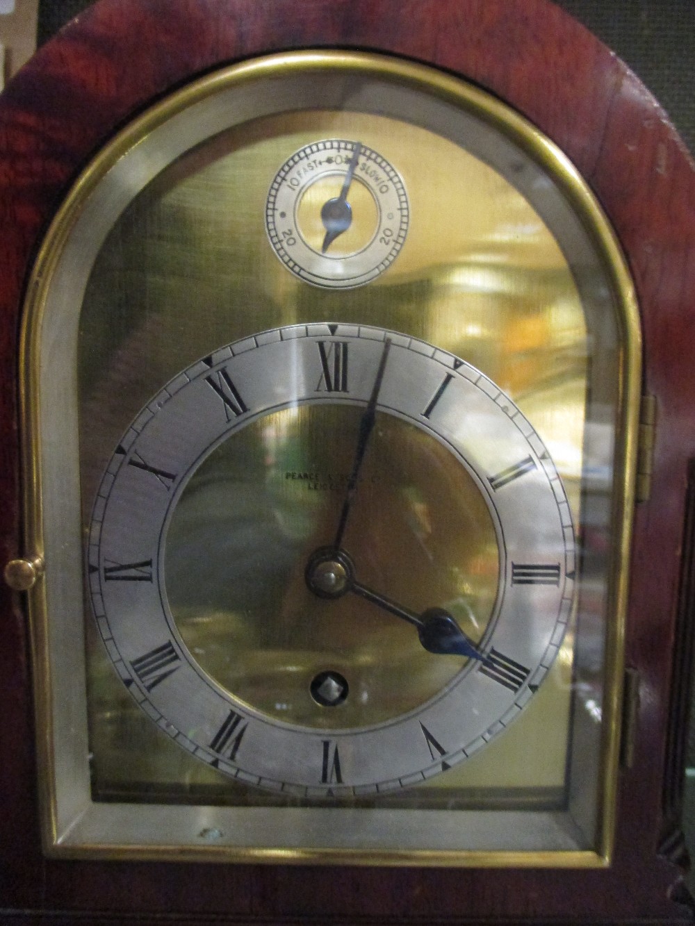 A figured mahogany domed top mantle timepiece with brass dial signed Pearce & Sons, Leicester, circa - Image 2 of 3