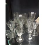 A set of four facet cut wine goblets & six custard cups