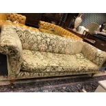 A late Victorian Chesterfield sofa, on turned satin walnut legs and brass casters, 220cm wide