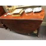 A mid 18th century mahogany drop flap dining table, 153cm wide, 181cm when open