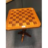 A small chess top occasional table, 38cm sq
