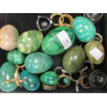 Three malachite egg hand coolers together with nine other green stone eggs (12)