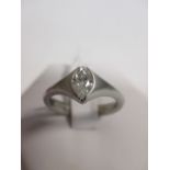 A marquise diamond and platinum ring, estimated approx. 0.58cts, in a rubover setting to broad