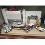 A Mercedes-Benz 300 SL (1954) by Burago and various model cars