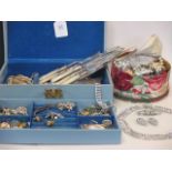 Two boxes of mixed jewellery to include a shell cameo brooch, silver, costume jewellery etc
