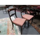A set of 7 Regency rosewood bar back dining chairs (7)
