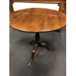 A 19th century mahogany wine table with birdcage action on tripod base, 70cm h x 78cm d