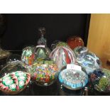A large collection of mixed British and Continental glass paperweights