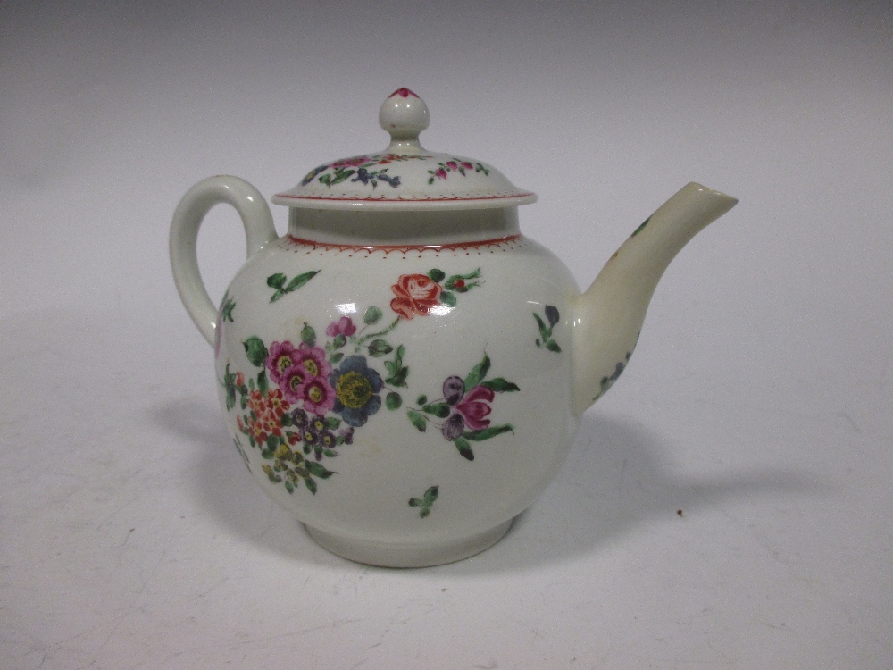 An 18th century Worcester polychrome tea pot and cover