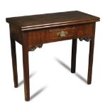 A George III mahogany rectangular tea table, the fold-over top supported on square chamfered legs