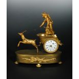 Johnston, a 19th century gilt metal timepiece, modelled as a Diana driving a stag driven chariot,