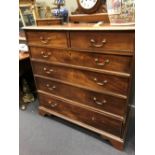 A George III mahogany Chest of two short and four long graduated drawers, 107cm wide, 110cm high