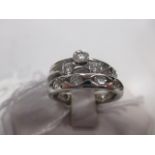 Three diamond and platinum rings: a three quarter hoop diamond ring set with eight round brilliant