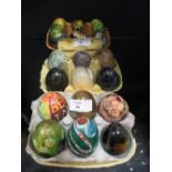 Nine specimen stone egg/ handcoolers and nine painted eggs