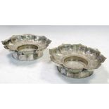 A pair of early 20th century Chinese silver cup stands, 10.5cm (4 in) diameter (2)