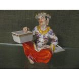 20th century Meissen figure of a seated Chinaman, crossed swords mark in blue