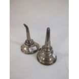 Two silver wine funnels, one George III example by Solomon Hougham, London 1800 (lacks hook) the