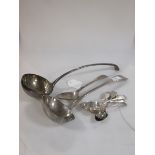 A Georgian Onslow pattern silver ladle, London, 1754 (repaired), a mixed small group of fiddle...